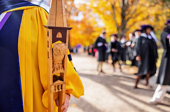 Graduate parade on Middle Path with College mace